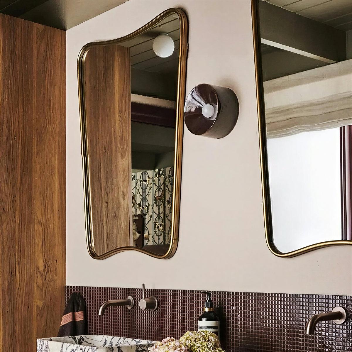 Circular Wall Sconce Light With Reflective Design And Sculptural Glow