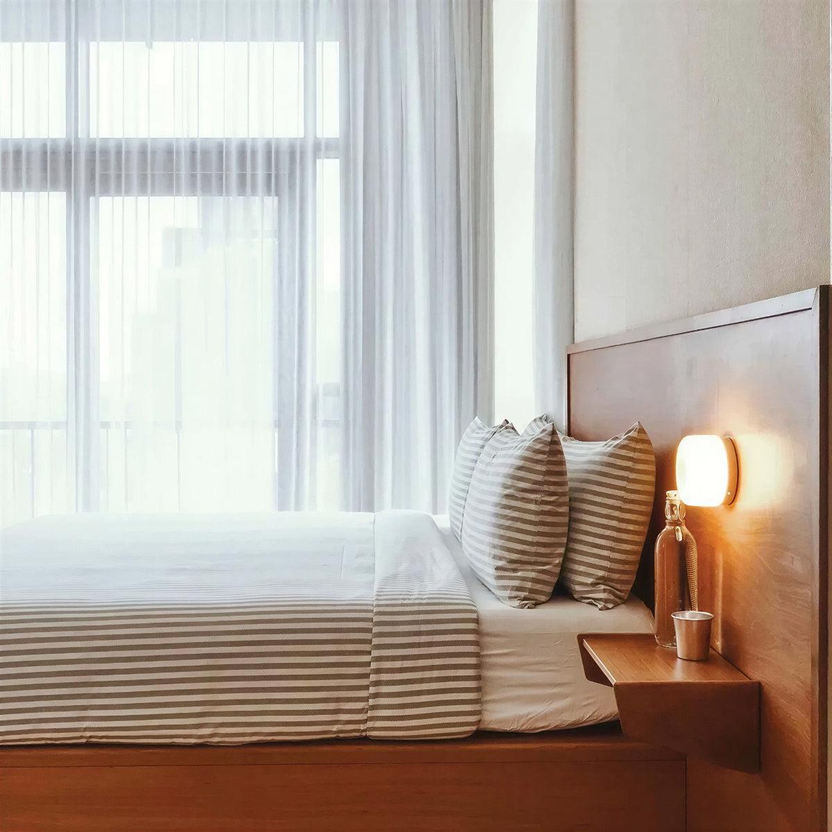 Round Dimple Wall Sconce Light With Ambient Flush Glow