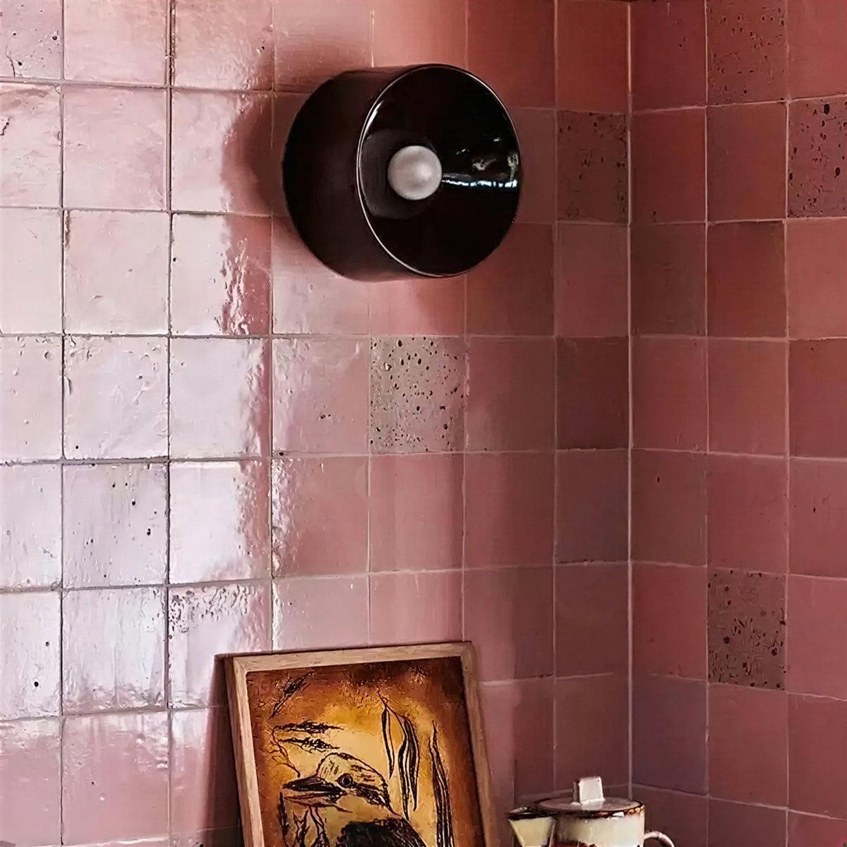 Circular Wall Sconce Light With Reflective Design And Sculptural Glow